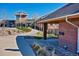 Westridge Community Pool building with brick exterior and lush landscaping at 9652 Cove Creek Dr, Highlands Ranch, CO 80129