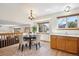 Dining Area featuring wood flooring and views into living room at 9652 Cove Creek Dr, Highlands Ranch, CO 80129