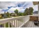 Lovely balcony showcases the neighborhood, blue skies, and greenery at 940 Kearney St, Denver, CO 80220