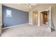 Bright bedroom features vaulted ceiling, ceiling fan, and natural light from two windows at 940 Kearney St, Denver, CO 80220