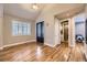 Bonus room featuring hard wood floors, plantation shutters, and access to en suite bath at 940 Kearney St, Denver, CO 80220