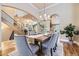 Elegant dining room showcases a stylish table, modern light fixture, and an open layout connecting multiple living areas at 940 Kearney St, Denver, CO 80220