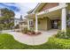 Charming two-story home featuring an inviting front yard and covered porch area at 940 Kearney St, Denver, CO 80220