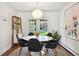 Charming dining room with a modern light fixture and stylish decor at 2774 S Milwaukee St, Denver, CO 80210