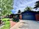 Stylish brick home with a spacious driveway and a well-maintained lawn at 2774 S Milwaukee St, Denver, CO 80210