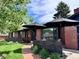 Beautiful brick home with a lovely brick walkway and charming outdoor space at 2774 S Milwaukee St, Denver, CO 80210