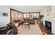 Spacious living room with an open layout, fireplace, and hardwood flooring at 2774 S Milwaukee St, Denver, CO 80210