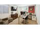 Home office with modern desk, comfortable seating, and natural light from the window at 2774 S Milwaukee St, Denver, CO 80210