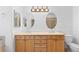 Bathroom featuring dual sinks and vanities with great countertop space at 1172 S Steele St, Denver, CO 80210