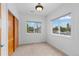 Bright bedroom featuring two large windows and a closet at 1172 S Steele St, Denver, CO 80210