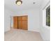 Bedroom featuring a window, closet and carpeted floor at 1172 S Steele St, Denver, CO 80210