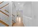 Inviting entryway features a staircase and an open view of the main living area at 1172 S Steele St, Denver, CO 80210