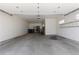 Spacious two-car garage with storage and utility sink at 1172 S Steele St, Denver, CO 80210