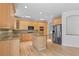 Bright kitchen featuring stainless steel appliances, granite countertops, and hardwood flooring at 1172 S Steele St, Denver, CO 80210