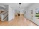 Spacious living room with fireplace and access to the outside at 1172 S Steele St, Denver, CO 80210