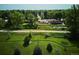 Birds eye view of the property and its surrounding landscape from above with a path in the foreground at 2300 Crabtree Dr, Centennial, CO 80121