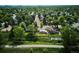 Stunning aerial view of the property showcasing its lush green surroundings and neighborhood charm at 2300 Crabtree Dr, Centennial, CO 80121