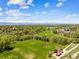Scenic aerial view of a sprawling park with green spaces, walking paths, and recreational facilities at 2300 Crabtree Dr, Centennial, CO 80121