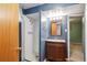 This stylish bathroom features a walk-in shower and modern vanity with ample counter space and storage at 2300 Crabtree Dr, Centennial, CO 80121