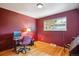 This bedroom offers a dedicated workspace with desk and chair, perfect for a home office at 2300 Crabtree Dr, Centennial, CO 80121