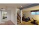 The finished basement features exercise equipment and laundry hookups at 9864 Carmel Ct, Lone Tree, CO 80124