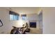 This basement features a fireplace and natural light with large windows at 9864 Carmel Ct, Lone Tree, CO 80124