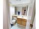 This bathroom has a shower, vanity, and toilet at 9864 Carmel Ct, Lone Tree, CO 80124
