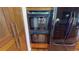 Modern kitchen featuring updated stainless steel double ovens and wood cabinets at 9864 Carmel Ct, Lone Tree, CO 80124