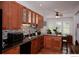 Renovated kitchen with stainless appliances, granite countertops, under cabinet lighting and eat in kitchen area at 9864 Carmel Ct, Lone Tree, CO 80124
