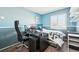 Bedroom featuring an organized desk with multiple monitors and natural light at 13036 W Cross Dr, Littleton, CO 80127