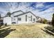 Large backyard with a shed, patio, and grass, perfect for entertaining at 13634 Monroe St, Thornton, CO 80602