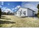 Expansive backyard includes a patio, lawn, and mature landscaping for outdoor living at 13634 Monroe St, Thornton, CO 80602
