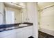 Bathroom with a large vanity and combined tub and shower at 13634 Monroe St, Thornton, CO 80602