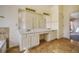 Spacious bathroom with dual sink vanity, large mirror, and tile flooring at 13634 Monroe St, Thornton, CO 80602