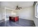 A room with a ceiling fan and desk at 13634 Monroe St, Thornton, CO 80602