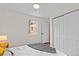 Bedroom features a large closet, hardwood floors, and ceiling fan at 936 Utica St, Denver, CO 80204