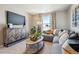 Cozy living room with sectional sofa and coffee table at 1950 Mount Monroe Dr, Berthoud, CO 80513