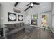 Cozy living room with fireplace, wood accents, comfortable seating, and bright natural light at 153 Sawmill Ln, Idaho Springs, CO 80452