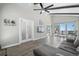Open living room with vaulted ceilings, fireplace, and dining area with scenic mountain views at 153 Sawmill Ln, Idaho Springs, CO 80452
