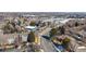 Wide aerial view with a community in the foreground and shops in the background at 7881 Allison Way # 204, Arvada, CO 80005