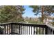 Balcony surrounded by lush green foliage offers scenic outdoor living at 7881 Allison Way # 204, Arvada, CO 80005