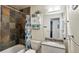 Well-lit bathroom featuring stylish tile shower, modern vanity and sink at 7881 Allison Way # 204, Arvada, CO 80005