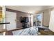 Inviting living room with a sliding glass door to a private balcony at 7881 Allison Way # 204, Arvada, CO 80005