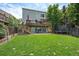 Multi-level deck and large backyard offering ample outdoor living and recreational space at 22379 E Dorado Ave, Aurora, CO 80015