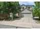 Charming two-story home with a well-maintained front yard and two-car garage at 22379 E Dorado Ave, Aurora, CO 80015