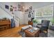 Inviting living room featuring hardwood floors, comfortable seating, and staircase at 22379 E Dorado Ave, Aurora, CO 80015