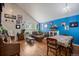 Bright living room with vaulted ceilings, hardwood floors, and ample natural light at 22379 E Dorado Ave, Aurora, CO 80015