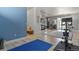 Bright living area featuring stylish decor, an open floor plan, with hardwood floors and a balcony at 5677 S Park Pl # 303, Englewood, CO 80111