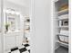 Half bath near a closet and shelving at 1980 S Xanadu Way # 208, Aurora, CO 80014