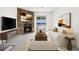 Cozy living room featuring a stone fireplace and sliding glass doors at 1980 S Xanadu Way # 208, Aurora, CO 80014